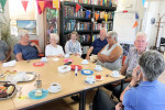 15. Veel vrijwilligers en bezoekers komen dit feit meevieren